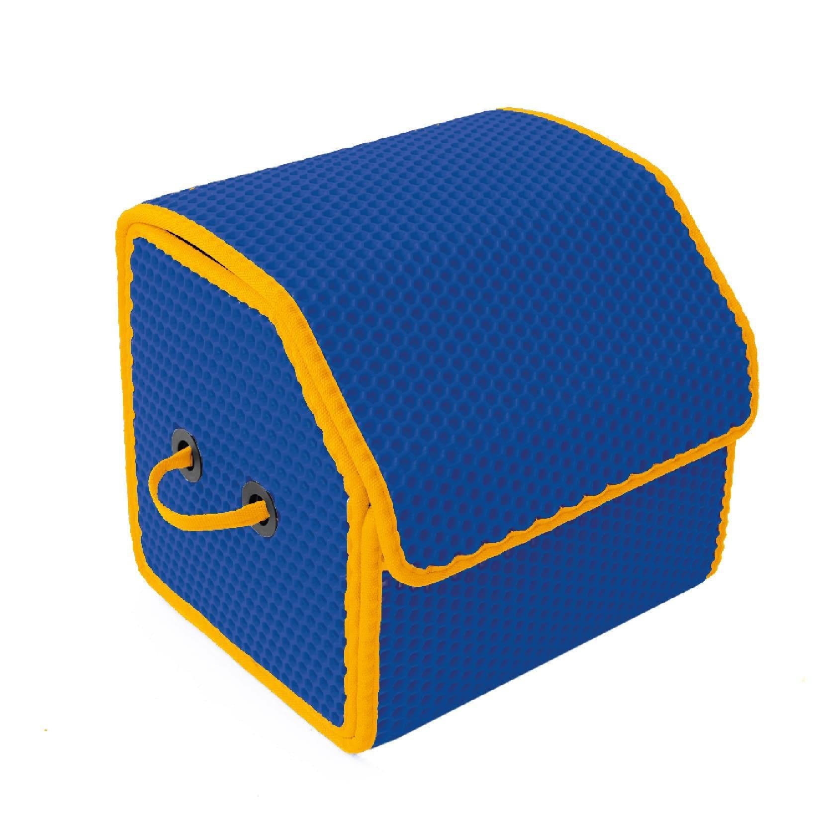 Blauer Aufbewahrungskasten mit gelbem Rand und Griffen aus schaumigem Material.