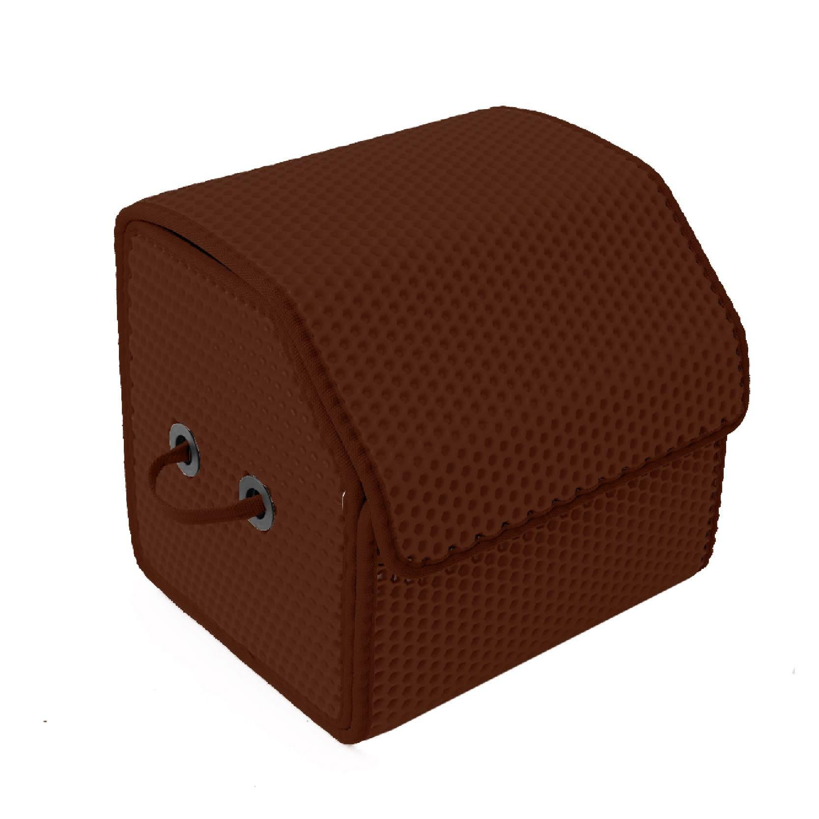 Braune Aufbewahrungsbox mit strukturiertem Design und zwei Griffen.