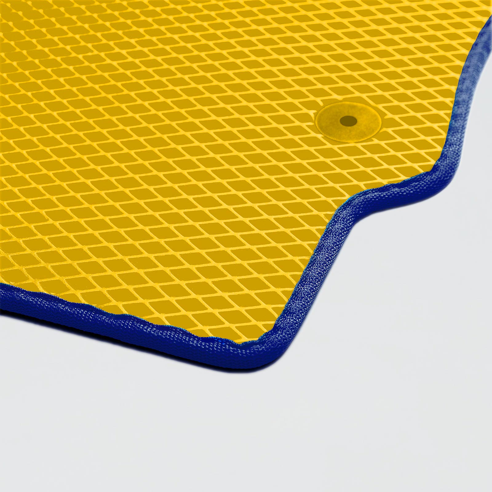Gelbe Matte mit rautenförmigem Design und blauer Umrandung