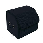 Schwarze Aufbewahrungstasche mit strukturiertem Material und Griffen.