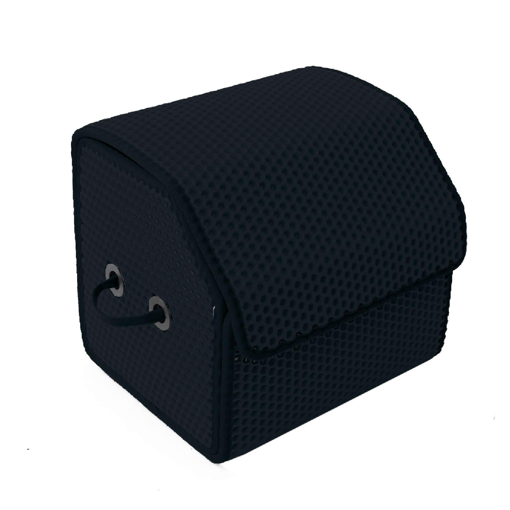 Schwarze Aufbewahrungsbox mit Griffen und strukturiertem Design.