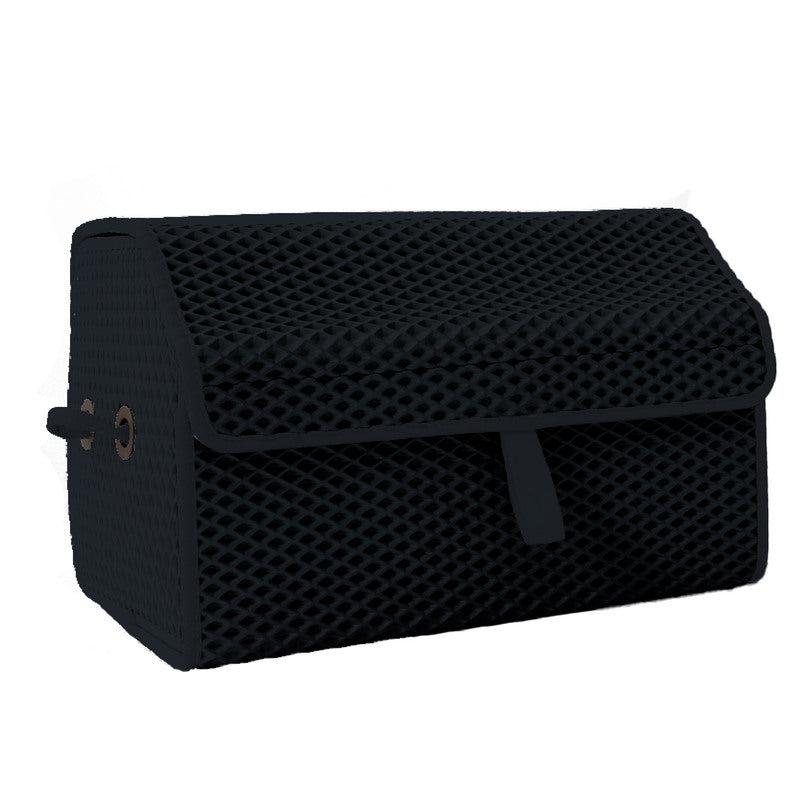Schwarze Aufbewahrungsbox aus Netzmaterial mit Klappe und Griff.